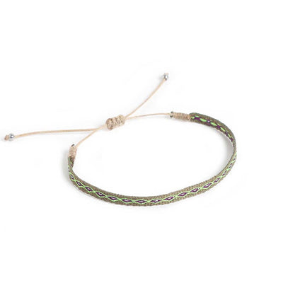 Handmade Mens Bracelets in braided cord design with green and purple diamond pattern.