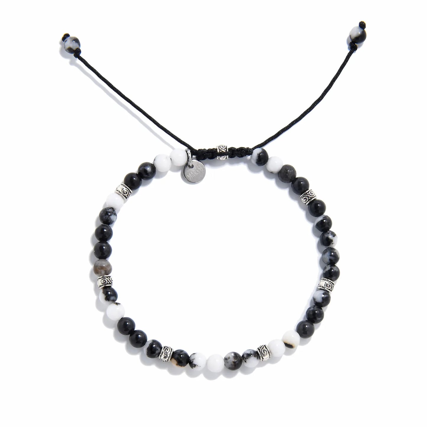 Top view of handmade zebra jasper bracelet with natural gemstone beads and silver accents.