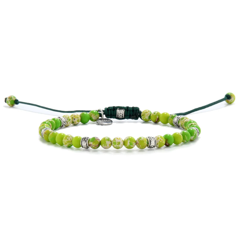 Elegant unisex Light Green Stone Bracelet with green cord and beads.