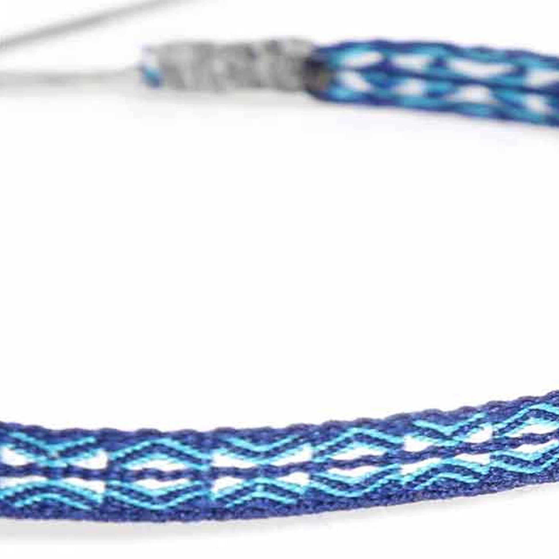 	Detailed view of woven pattern on blue bracelet