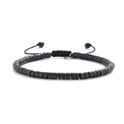 Full view of MAVROS men black bracelet made with polished black clay beads