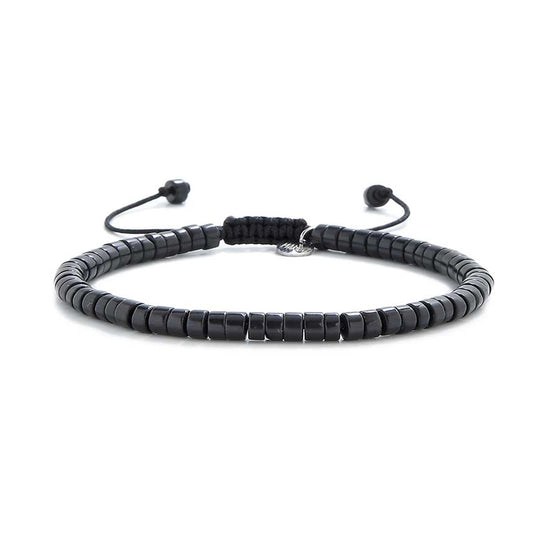 Full view of MAVROS men black bracelet made with polished black clay beads