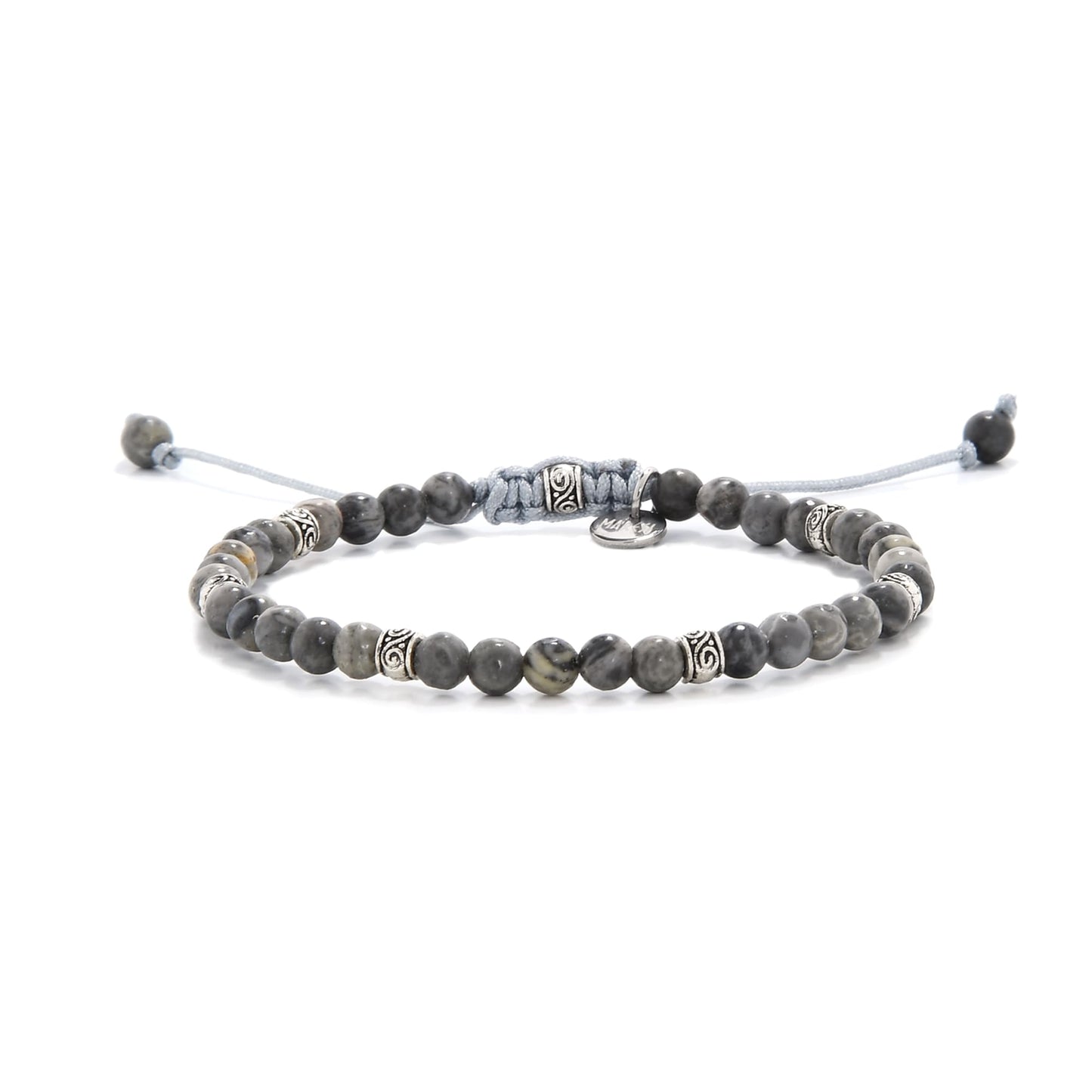 Gray jasper bracelet with silver accents and adjustable cord, styled on white background