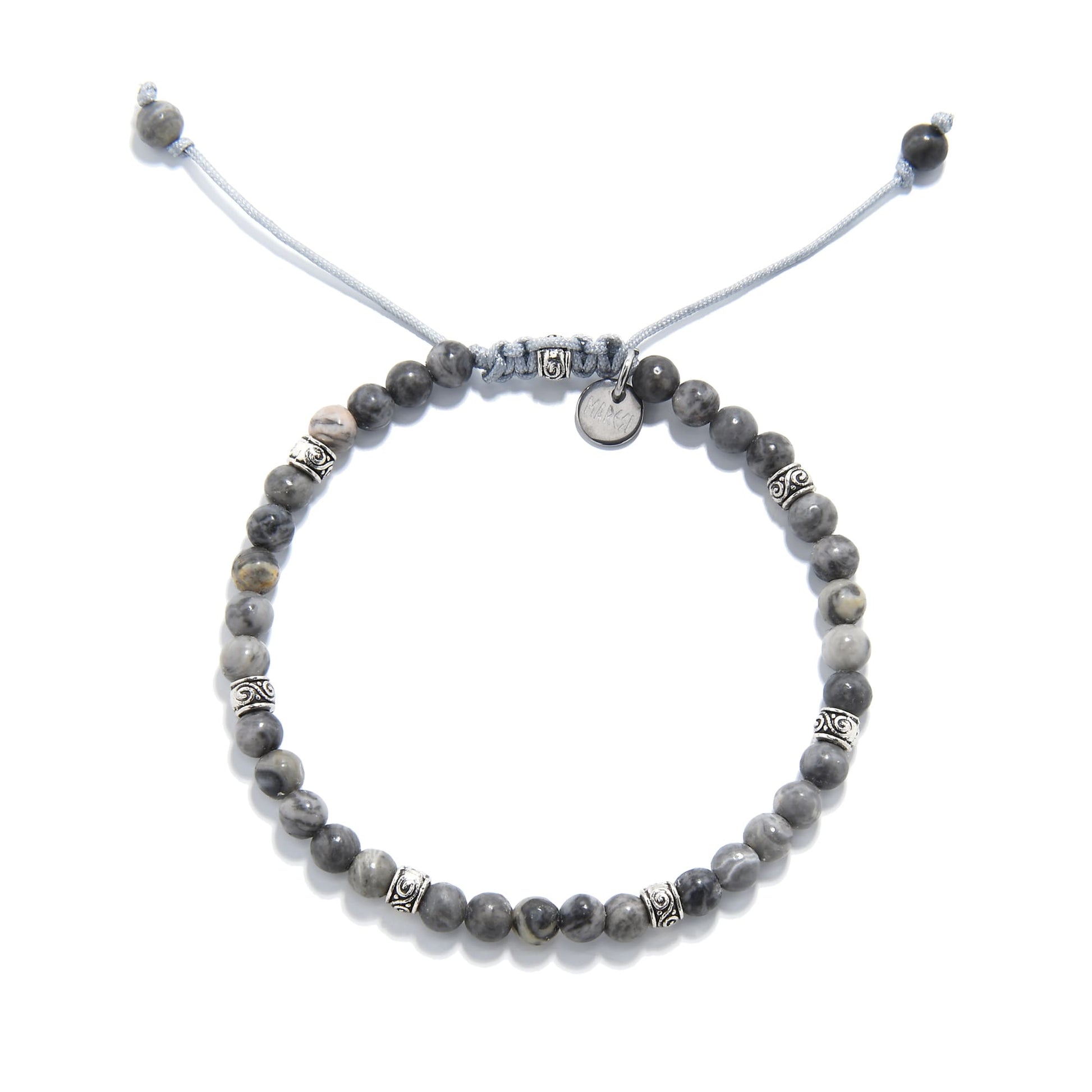 Top view of gray jasper bracelet showing full circular layout and detailed silver spacers