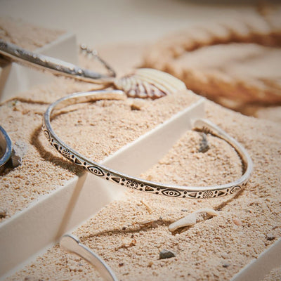 Stylish mens stainless steel bracelets featuring engraved tribal patterns for modern and casual wear.