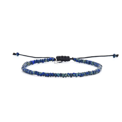 Minimalist men’s beaded bracelet with deep blue and turquoise speckled seed beads