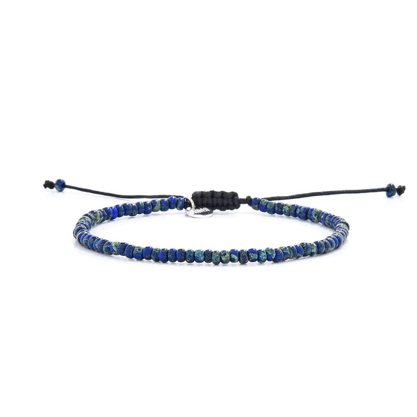 Minimalist men’s beaded bracelet with deep blue and turquoise speckled seed beads