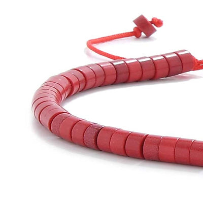 Close-up of mens red string bracelet made with matte clay beads and red cord