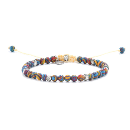 Multicolor malachite color bracelet featuring round beads and silver accents on an adjustable yellow cord.