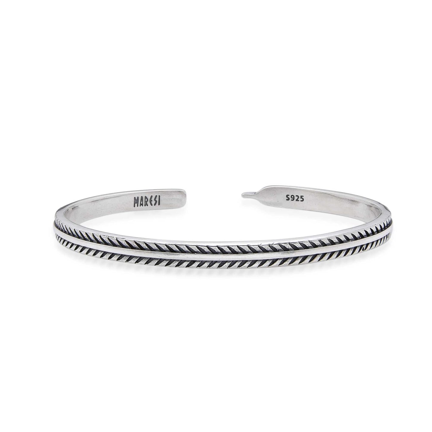 Close-up of the Pinna silver bangles bracelet with etched pattern