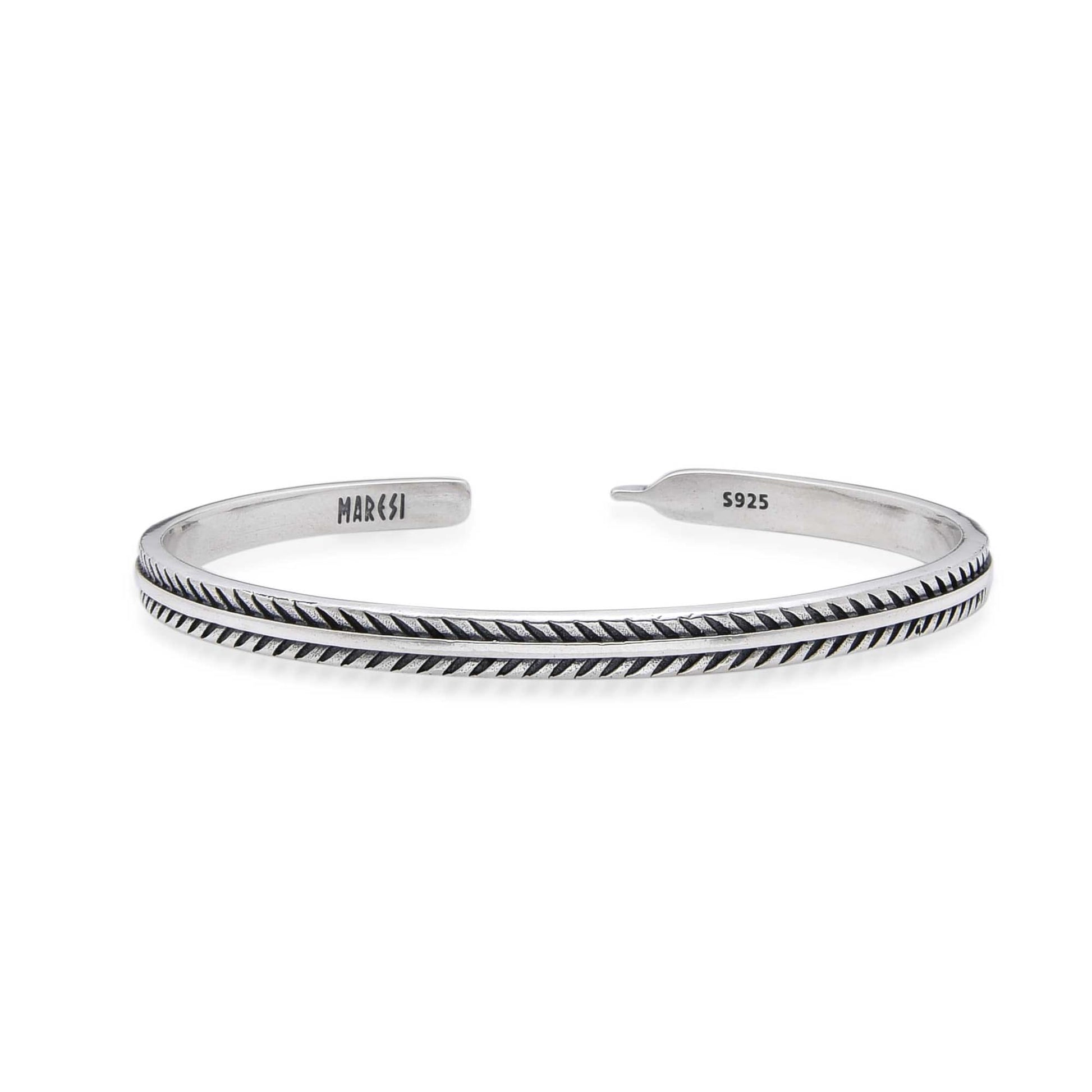 Close-up of the Pinna silver bangles bracelet with etched pattern