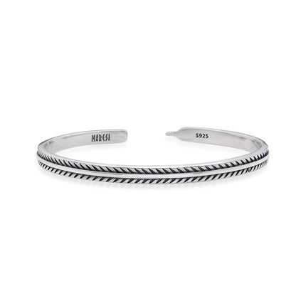 Close-up of the Pinna silver bangles bracelet with etched pattern