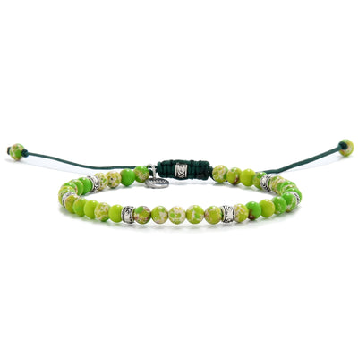 Elegant unisex raw green jasper bracelet with green cord and beads.
