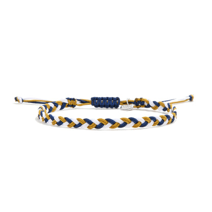 Sanluri adjustable friendship bracelet with gold, blue, and white braided cords.