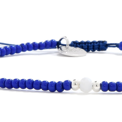 Close-up of seed bead bracelet idea in royal blue with white and silver accent beads