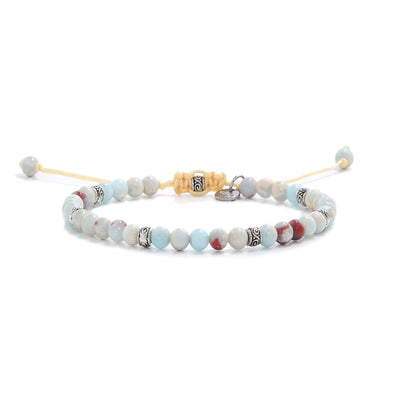 Shoushan stone bracelet featuring light blue and red beads on yellow cord.