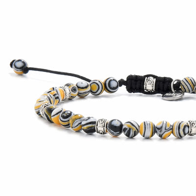 black yellow bracelet designed with man made malachite beads.