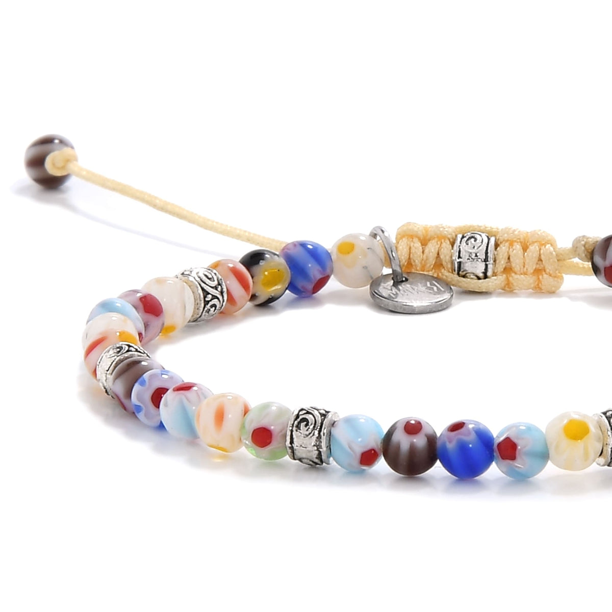 millefiori bead bracelet close-up highlighting individual patterns and silver accents