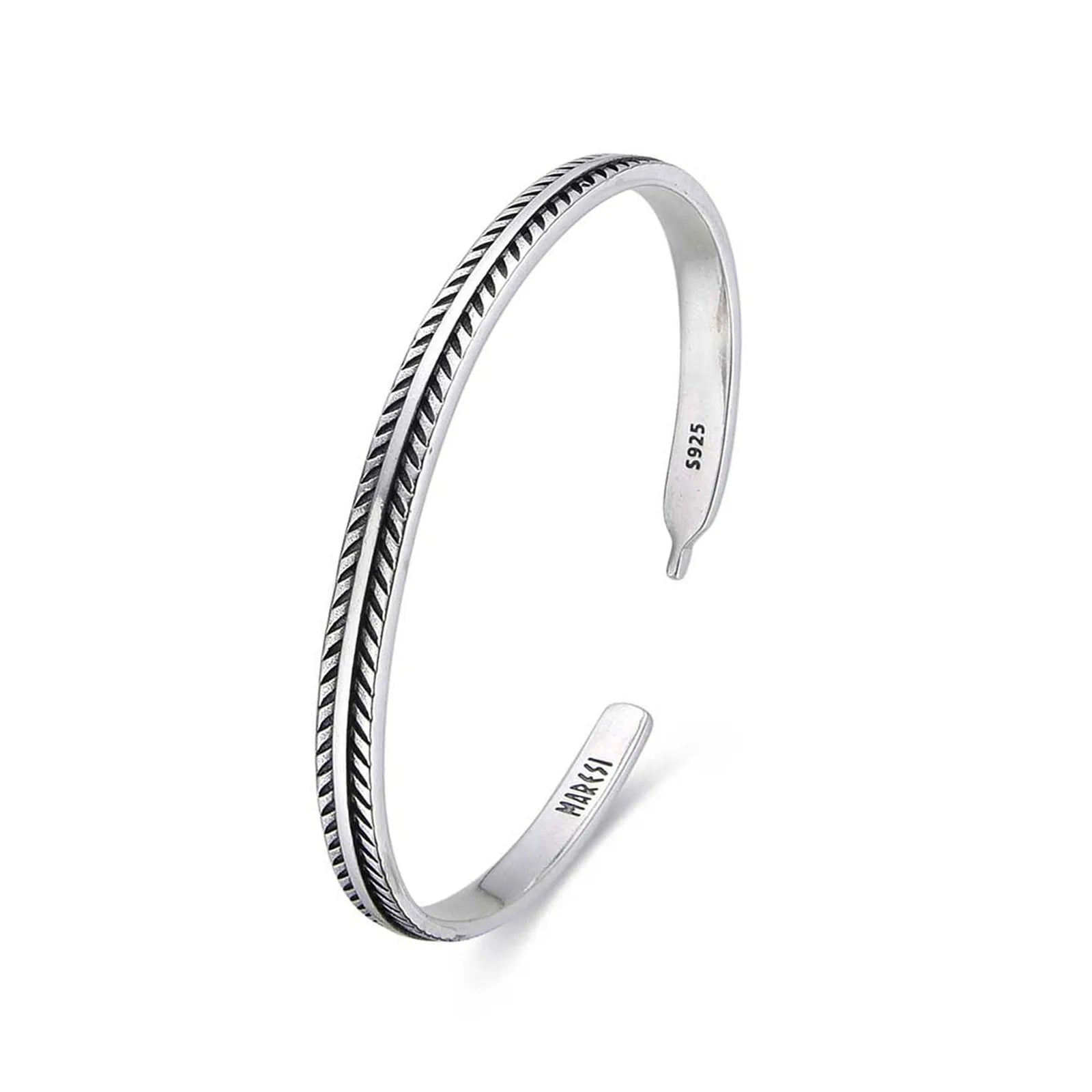 Bangles Bracelets shown in angled profile with open cuff shape and feather engraving