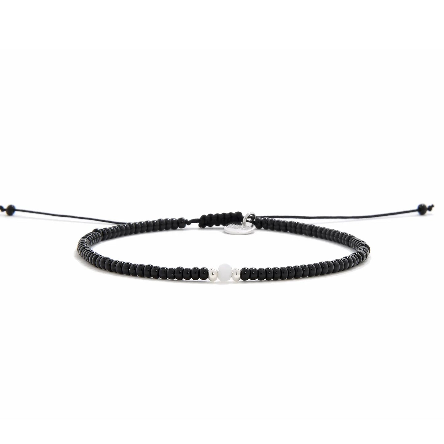 Bead Bracelet Black shown in full view with black seed beads with white accent beads and adjustable cord