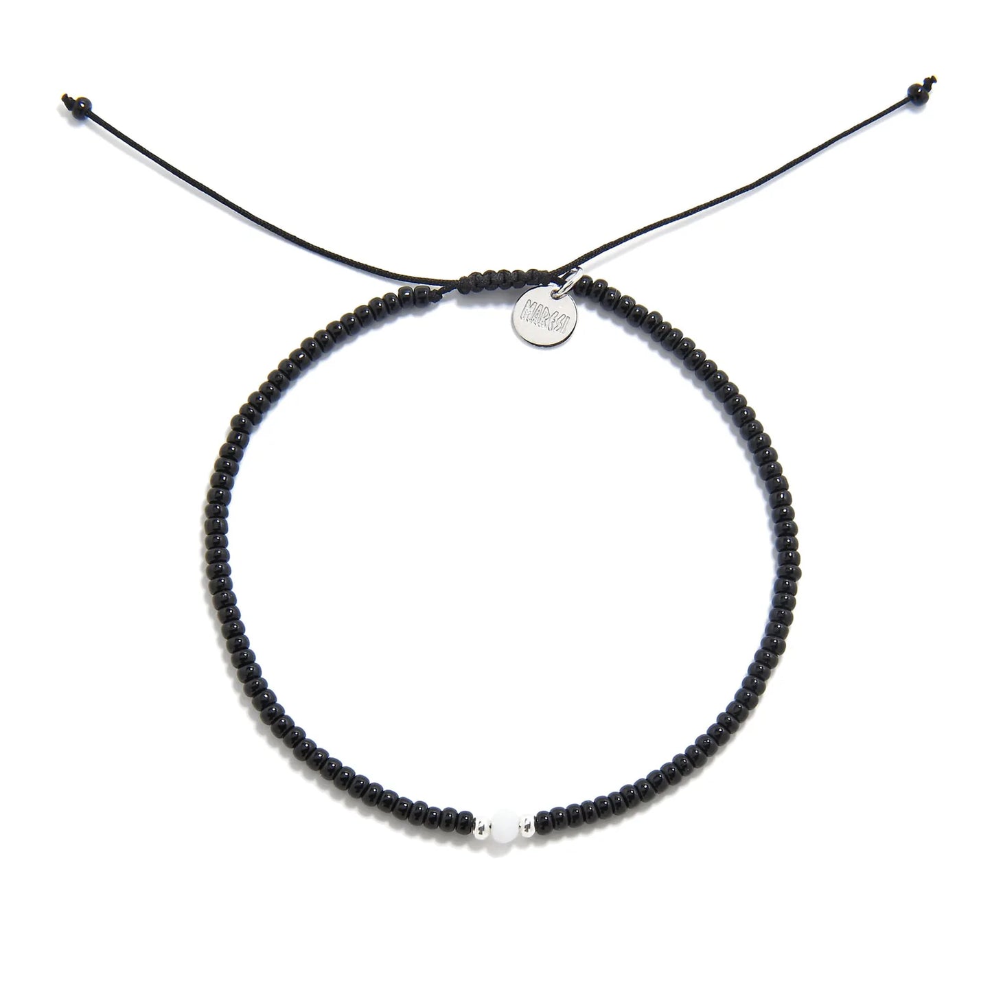 Bead Bracelet Black shown from above with black seed beads with white accent beads and round bracelet shape