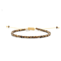 Bead Bracelets for Men shown in full view with brown Picasso seed beads with cream cord and adjustable cord