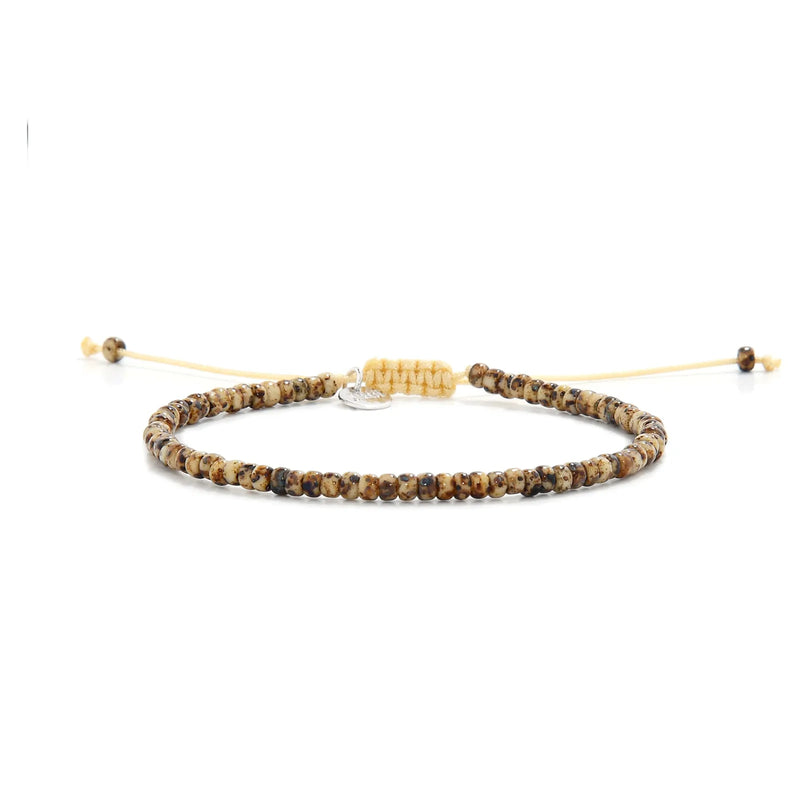 Bead Bracelets for Men shown in full view with brown Picasso seed beads with cream cord and adjustable cord