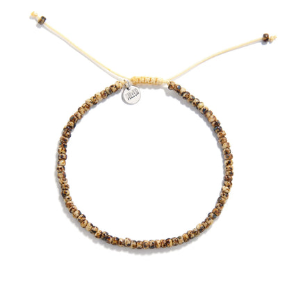Bead Bracelets for Men shown from above with brown Picasso seed beads with cream cord and round bracelet shape