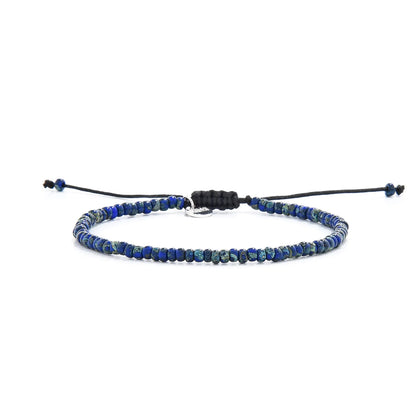 Beaded Bracelets for Men shown in full view with blue Picasso seed beads with black cord and adjustable cord