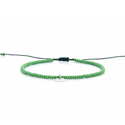 Beaded Stretch Bracelets shown in full view with green seed beads with dark green cord and adjustable cord