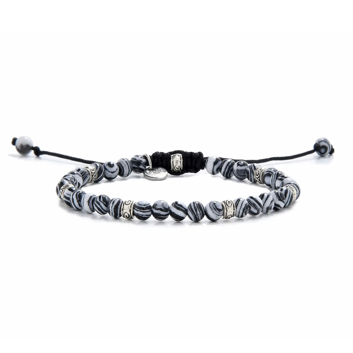 Full view of black and white beaded bracelet featuring striped black and white beads with silver spacers.