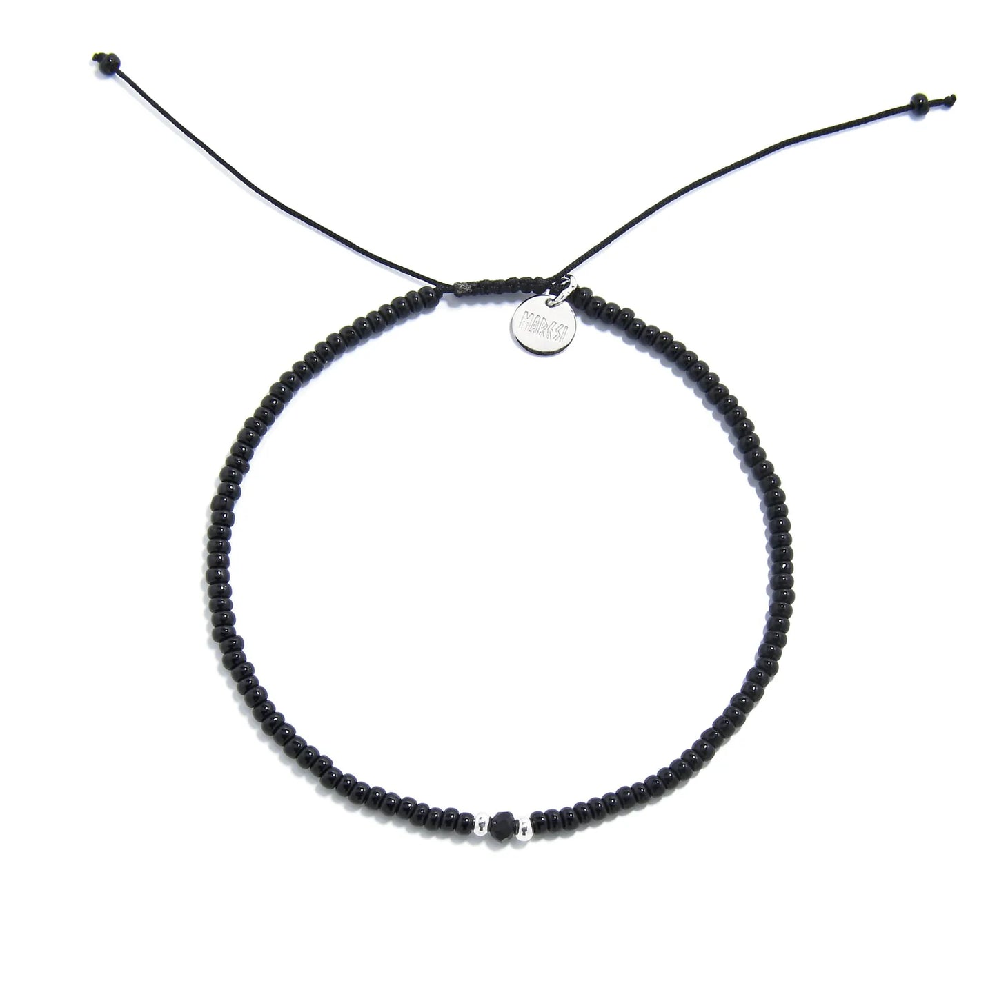 black crystal bracelet for men shown from above with black seed beads with dark faceted accents and round bracelet shape