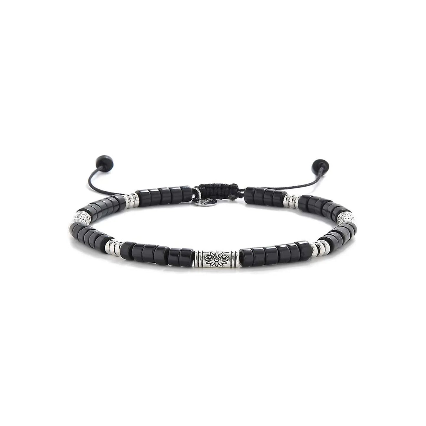 black shamballa bracelet shown in full view with black clay beads with engraved silver spacers and adjustable cord
