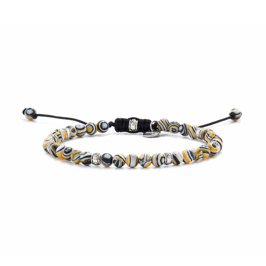 black yellow bracelet
made with polished man made malachite beads and silver details.