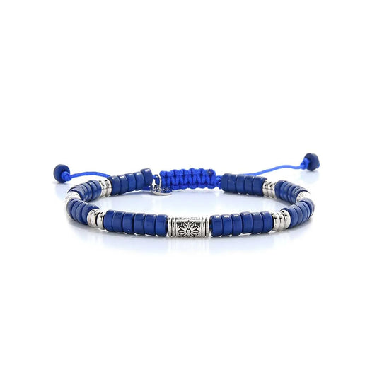 Blue Beads shown in full view with blue clay beads with engraved silver spacers and adjustable cord