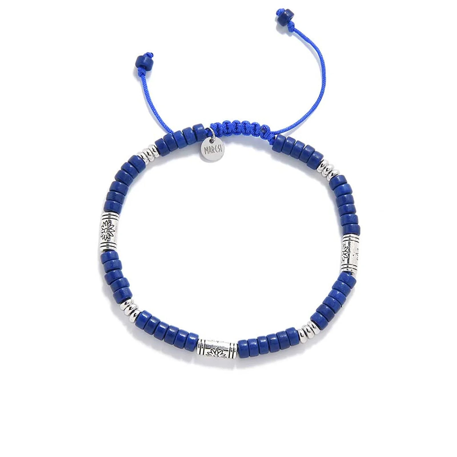Blue Beads shown from above with blue clay beads with engraved silver spacers and round bracelet shape