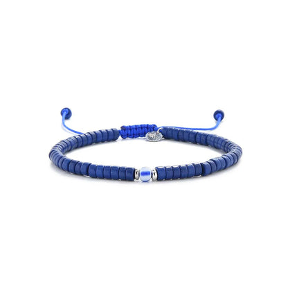 Blue Gemstone Jewelry shown in full view with blue clay beads with blue accent bead and adjustable cord