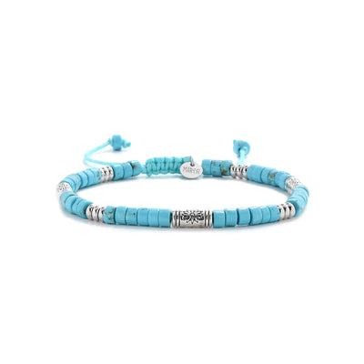 Bracelet of Clay shown in full view with turquoise clay beads with engraved silver spacers and adjustable cord