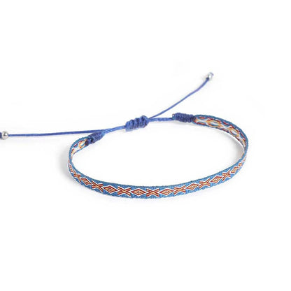 Braided Bracelets shown from above with blue patterned band and matching sliding knot closure