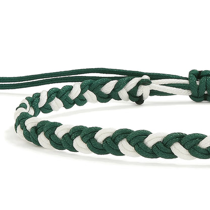 adjustable friendship bracelet close-up showing braided cord texture, adjustable knot, and charm detail