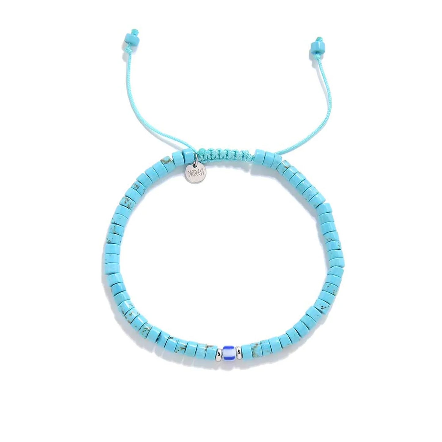 Clay Beads for Bracelets shown from above with turquoise clay beads with blue accent bead and round bracelet shape
