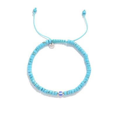 Clay Beads for Bracelets shown from above with turquoise clay beads with blue accent bead and round bracelet shape