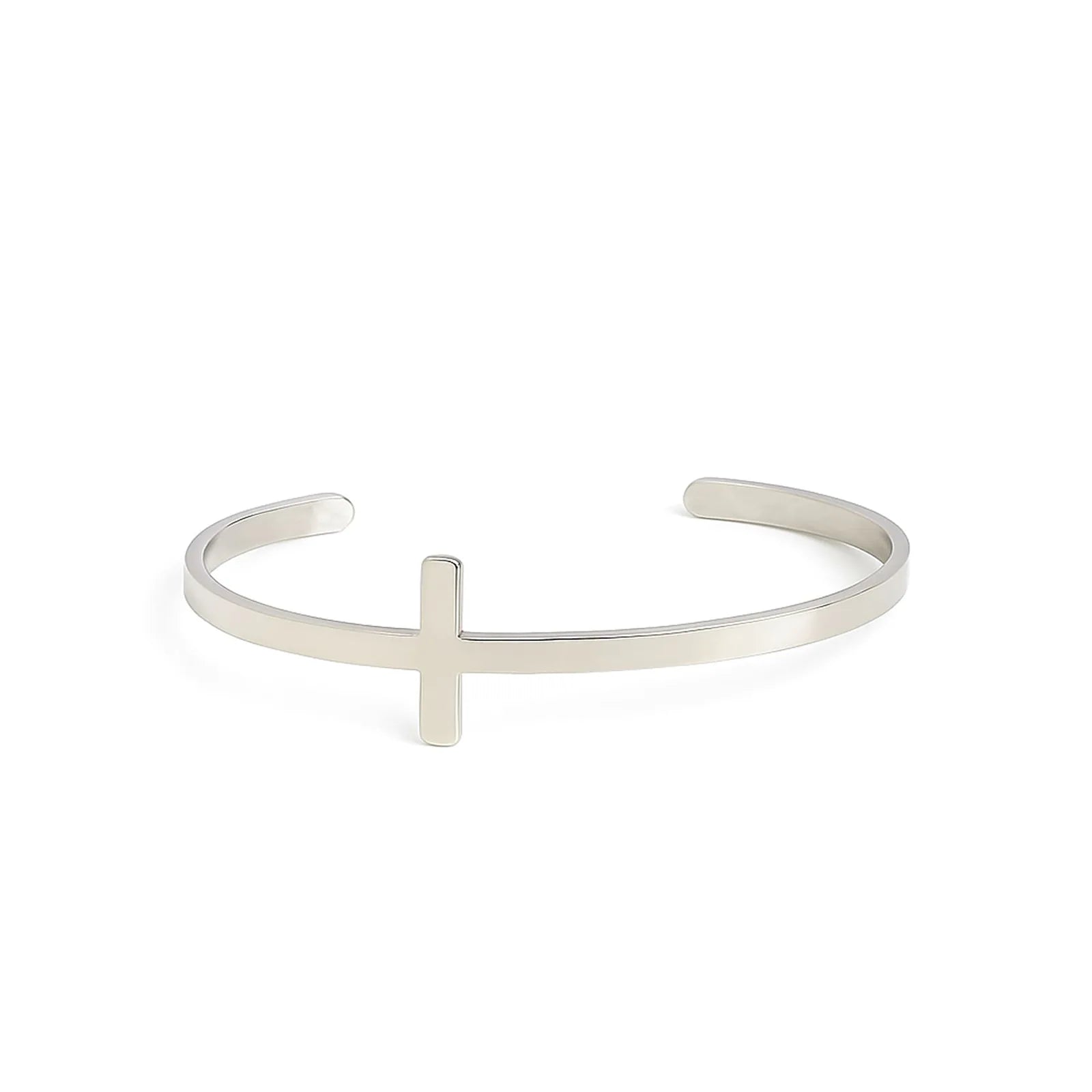 Cross bracelet with polished silver tone cuff, raised cross centerpiece, and open ends