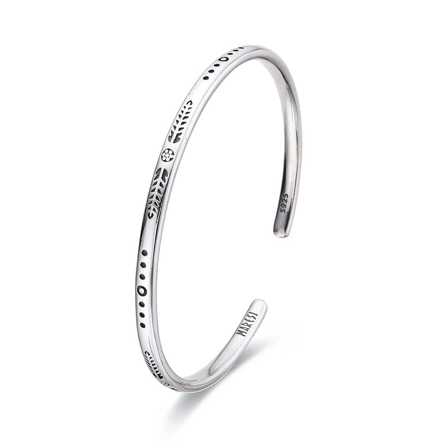 Cuff Bracelet for Men shown in angled profile with slim open shape and engraved symbols