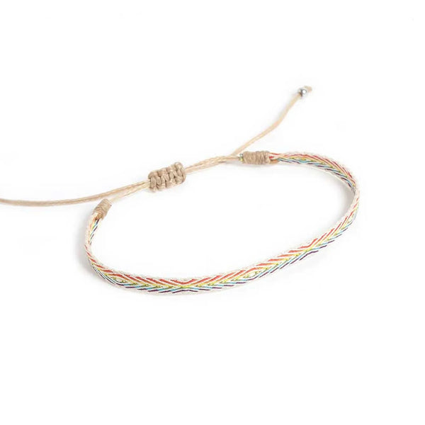 Handmade Bracelets shown from above with white rainbow band and sliding knot cord closure