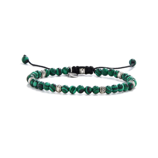 Malachite jewelry bracelet with black cord and polished green striped beads
