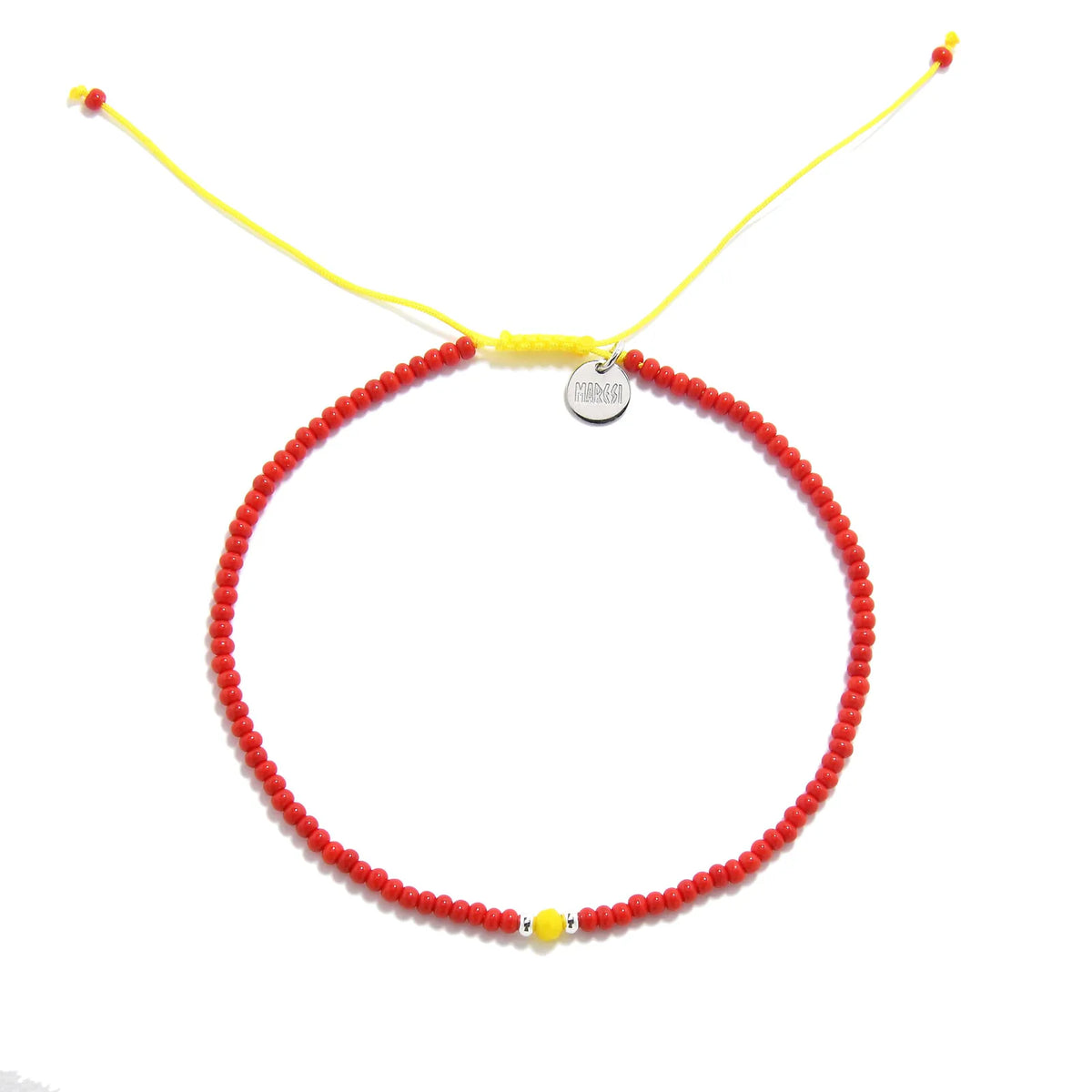 Man Bracelet Beads shown from above with red seed beads with yellow accent beads and round bracelet shape