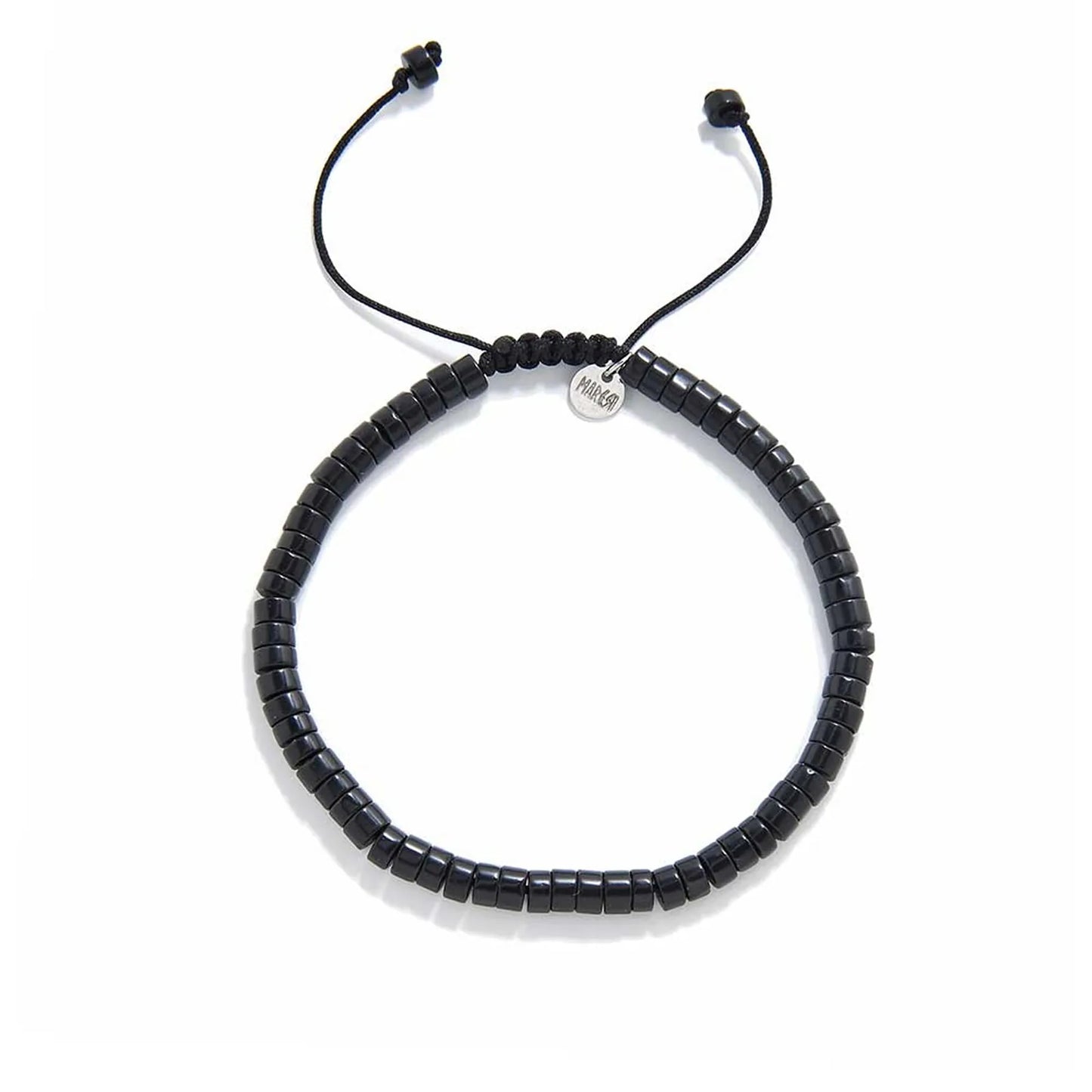 matte black bracelet shown from above with matte black clay beads with silver charm and round bracelet shape