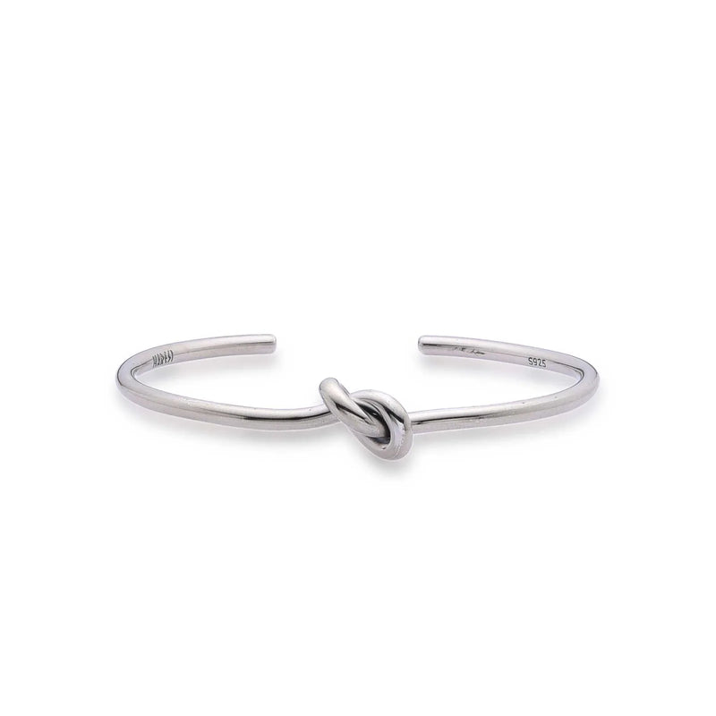 Men Silver Bracelet with polished open band, center knot detail, and stamped inner ends