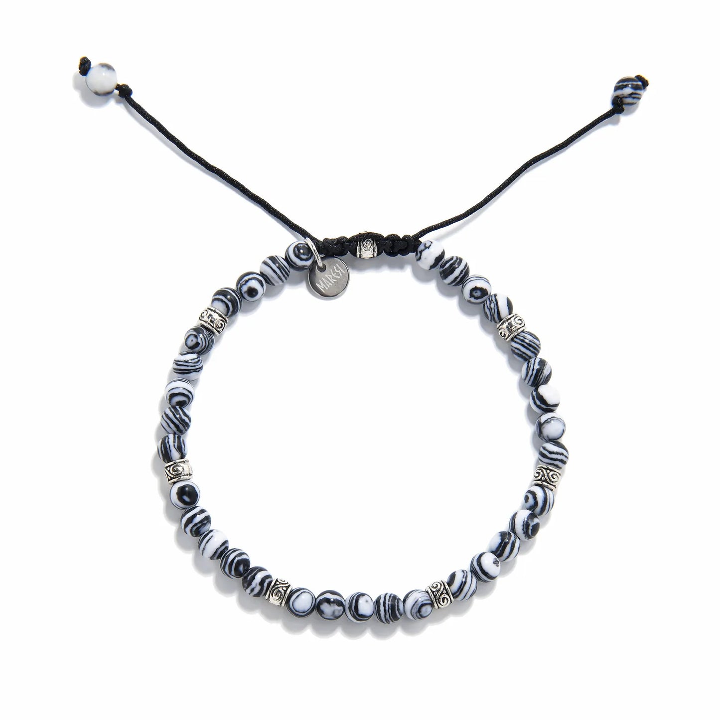 men’s malachite bracelet laid flat, showing circular pattern and woven cord clasp